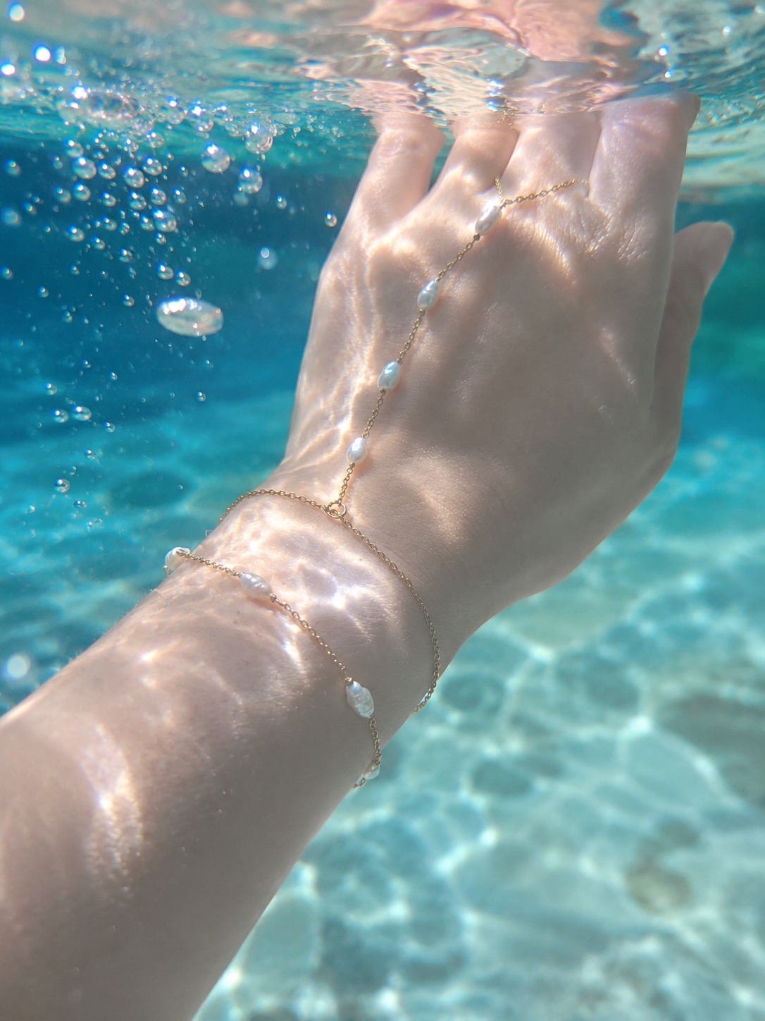 ÉTHERA Barely There Pearl Hand Chain  Custom Bridal Hand Jewelry