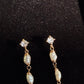 Letitia Linear Baroque Pearl Dangle Earrings