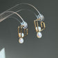 ORBITA Moving Freshwater Pearl Earrings in 14K Gold Filled