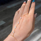 ÉTHERA Barely There Pearl Hand Chain  Custom Bridal Hand Jewelry